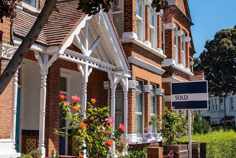 UK house with sold board outside