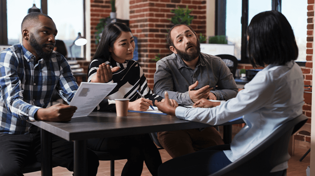 A panel of recruiters interviewing a candidate